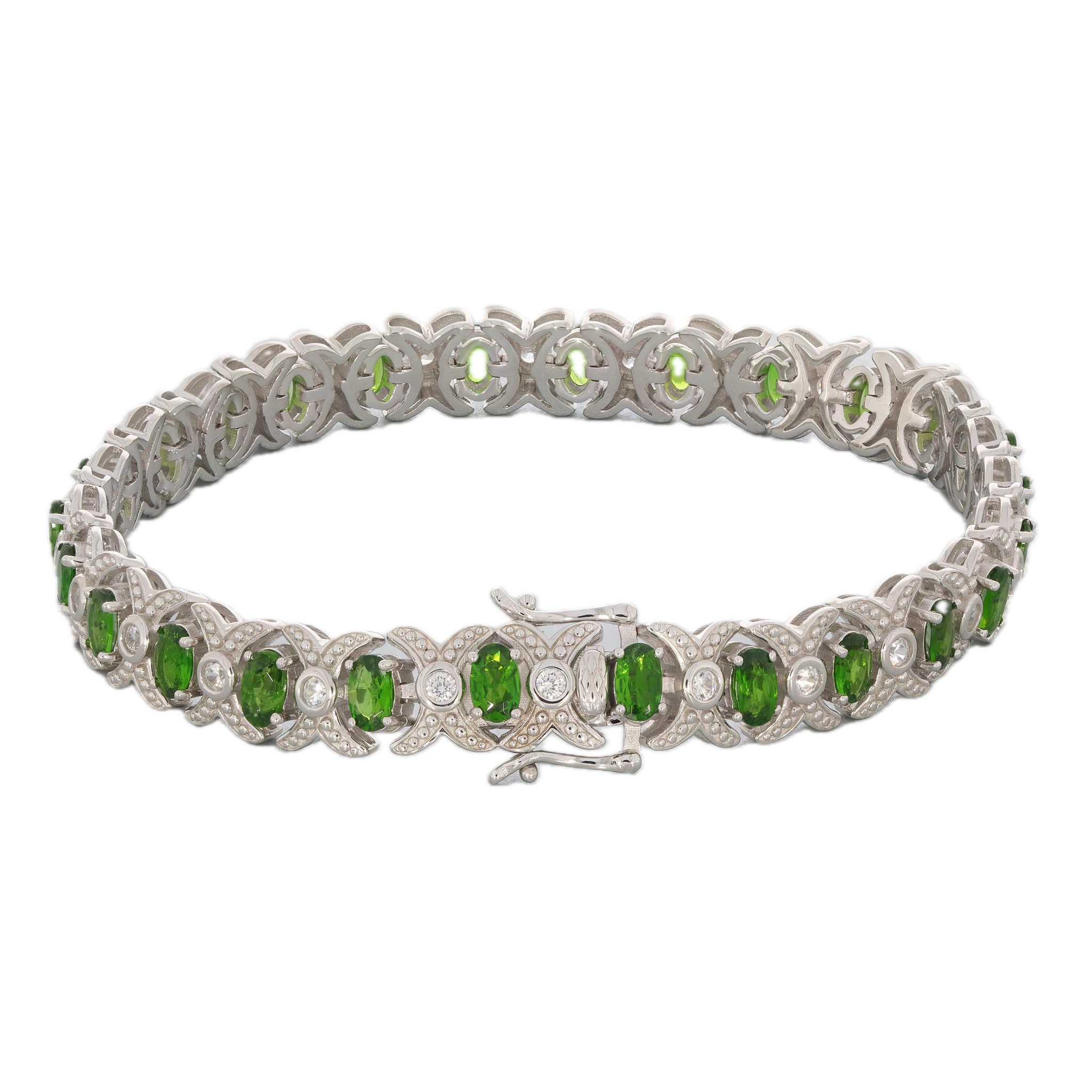 Oval green chrome diopside sterling silver bracelet with sparkling accents, showcasing elegance and luxury.