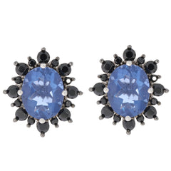 Oval blue sapphire sterling silver earrings with spinel accents, showcasing elegance and luxury.