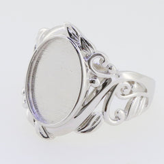 Custom sterling silver semi mount ring with elegant Art Nouveau design, featuring an oval setting for cabochon gemstones.
