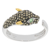 Stunning reptile-themed silver ring with a green gemstone and golden accents, perfect for unique jewelry lovers.