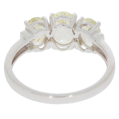 Elegant Green Peridot 14K White Gold Ring featuring three sparkling gemstones and a polished band, ideal for luxury jewelry collections.