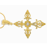 Elegant yellow cross pendant with intricate filigree design and sparkling gemstones, perfect for special occasions.