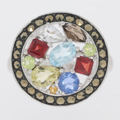 Marquise multicolor topaz sterling silver ring with garnet accents, showcasing vibrant gemstones and elegant design.