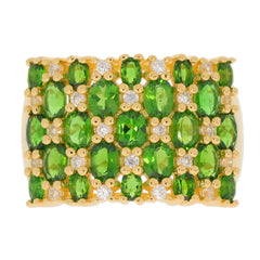 Elegant gold ring featuring multiple green Chrome Diopside gemstones and sparkling accents for a luxurious touch.