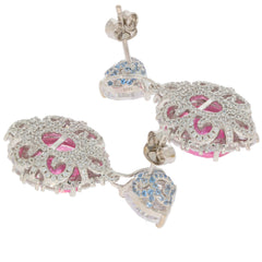 Elegant pink sapphire and blue zircon sterling silver earrings, featuring intricate lace design and a radiant finish.