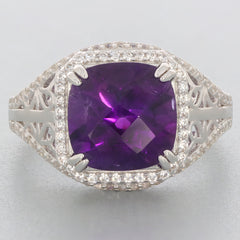 Emerald purple amethyst sterling silver ring with accent gemstones, showcasing a sparkling purple stone in an elegant design.