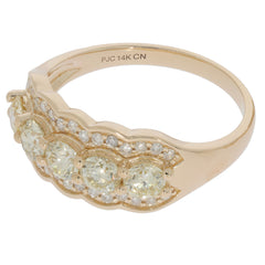 Elegant 14K Yellow Gold ring featuring a scalloped design and sparkling round gemstones, perfect for sophisticated style.