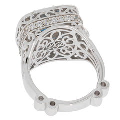 Cushion Blue London Topaz Sterling Silver Ring with Moissanite Accent, showcasing intricate filigree design.