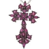 Purple Garnet Sterling Silver pendant with floral design, featuring sparkling gemstones in a cross shape.