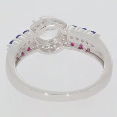 Back view of a Round White Moissanite Sterling Silver Ring showcasing accent gemstones in blue and pink.