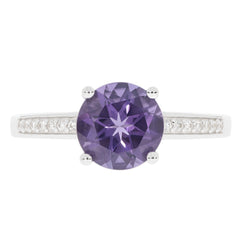 Round purple sapphire sterling silver ring with accent stones for elegant style and luxury.