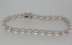 Sterling Silver Semi Mount Tennis Bracelet Setting with oval stone holders, designed for an elegant look and longer-lasting quality.