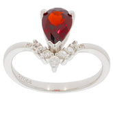 Pear Red Garnet sterling silver ring with Moissanite accents, featuring a stunning gemstone and elegant design.