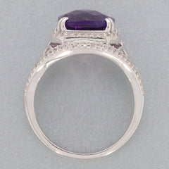 Emerald cut purple amethyst sterling silver ring featuring sparkling accents, ideal for elegant styling.