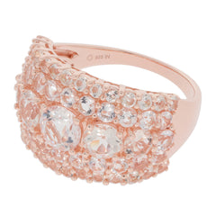 Rose gold statement ring with sparkling gems in an elegant design, perfect for adding glamour to any outfit.