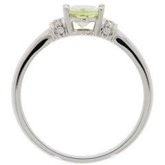 Green Peridot 14K white gold ring featuring diamond accents, showcasing elegance and luxury.