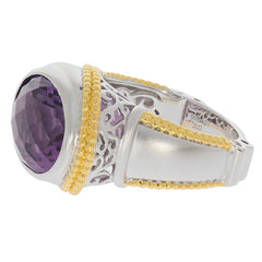 Elegant oval purple amethyst sterling silver ring with accent detailing and gold embellishments.