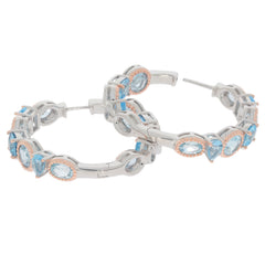 Cushion blue aquamarine sterling silver earrings with accent gemstones, showcasing elegance and luxury.