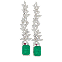 Green emerald sterling silver earrings with floral accents, showcasing elegance and luxury.