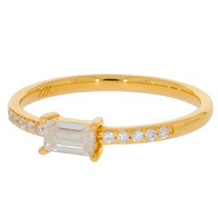 Gold ring with emerald-cut gemstone and diamond accents, ideal for elegant styles and luxury aesthetics.