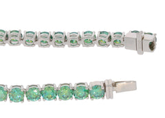 Green Moissanite sterling silver bracelet showcasing sparkling gemstones in an elegant design.