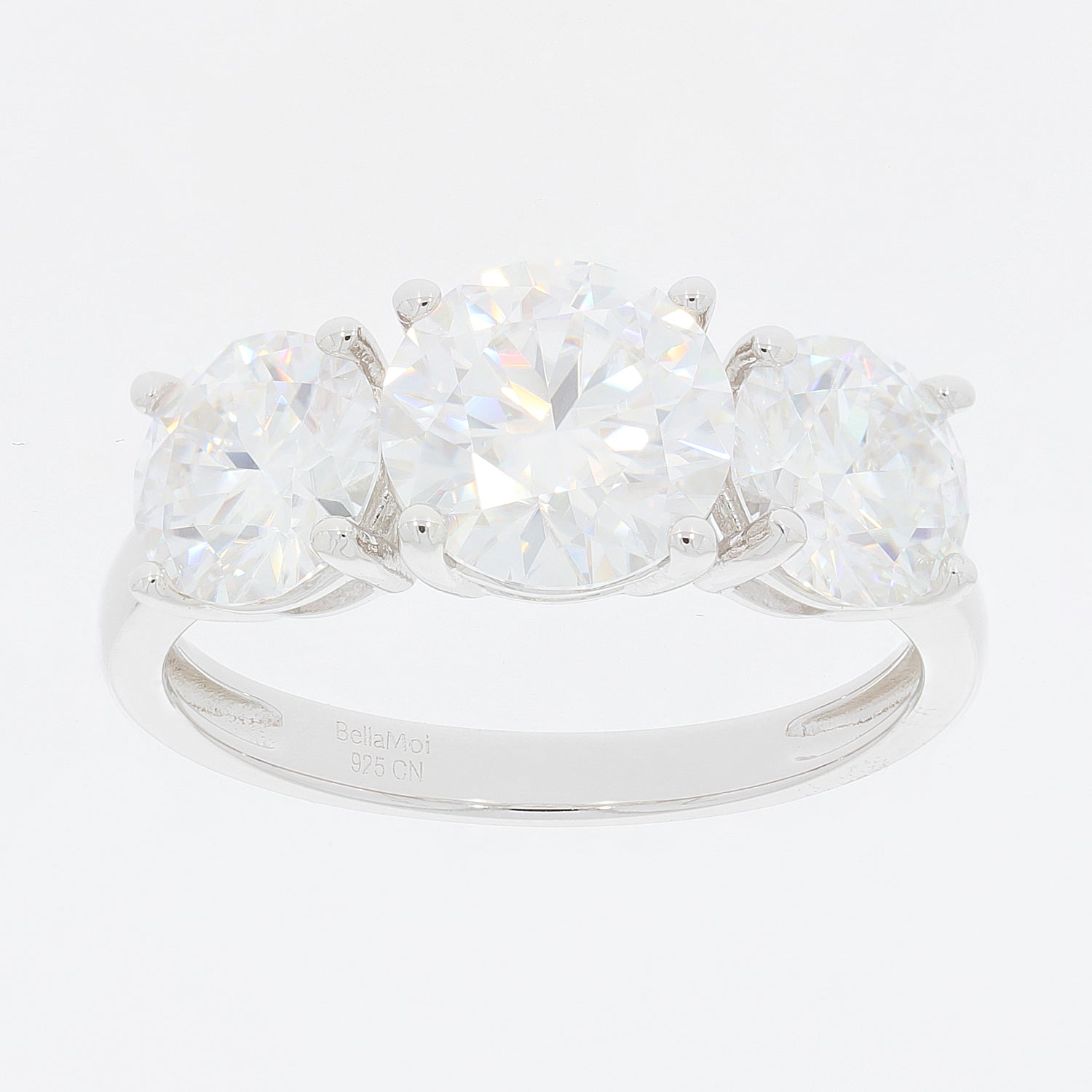 Round white Moissanite sterling silver ring with three sparkling stones for a luxurious look.