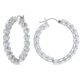 Elegant white Moissanite sterling silver earrings showcasing sparkling gemstones in an exquisite hoop design.