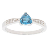 Trillion Blue Topaz Sterling Silver Ring with accent stones, showcasing a stunning blue gemstone in a luxurious design.