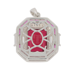 Elegant red ruby sterling silver pendant, featuring a sparkling gemstone in intricate design.