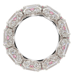 Elegant sterling silver ring featuring Moissanite and pink accents, perfect for luxury jewelry collections.