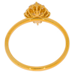 Gold ring with a decorative top design, showcasing an elegant band and intricate details.