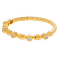 22K gold ring featuring a delicate design with sparkling diamond accents, perfect for elegant everyday wear.