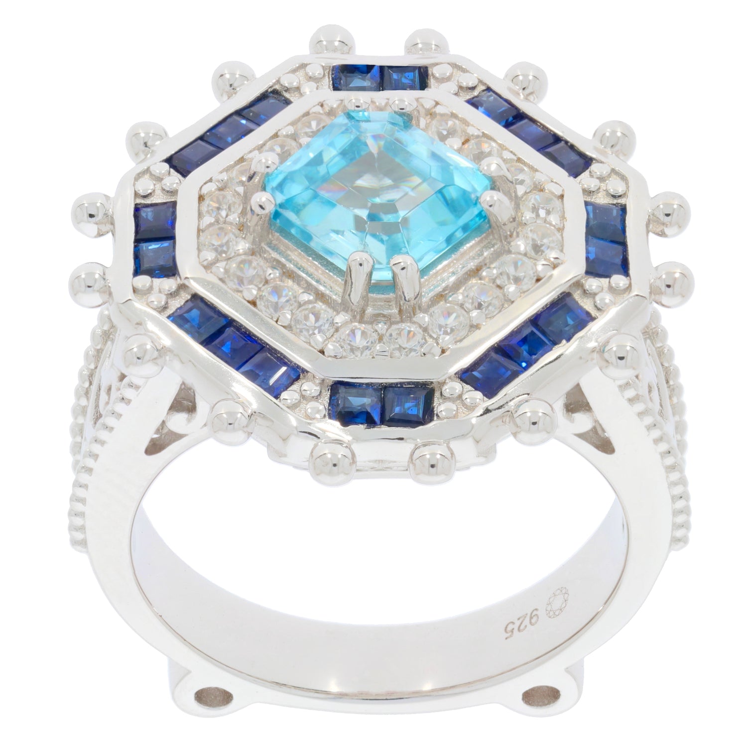 Emerald blue topaz sterling silver ring with accent stones, showcasing a stunning gemstone in a luxurious design.
