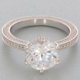 White Moissanite sterling silver ring showcasing a brilliant gemstone and elegant band design.