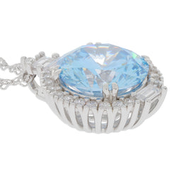 Round blue topaz sterling silver pendant with sparkling accents, adding elegance to any jewelry collection.