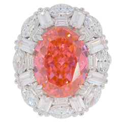 Oval orange sapphire sterling silver ring with moissanite accents, showcasing a vibrant gemstone and elegant design.