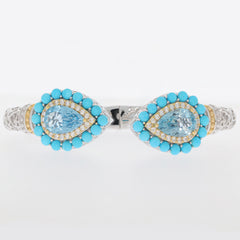 Pear Blue Topaz Sterling Silver Bracelet with Turquoise accent, featuring exquisite gemstone design and elegant style.