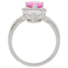 Pink Sapphire sterling silver ring with Moissanite accent, showcasing elegant design and luxurious sparkle.
