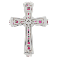 18K white gold cross pendant featuring red gemstones, symbolizing faith and elegance, perfect for meaningful occasions.