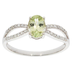 Green Peridot 14K White Gold Ring with Diamond Accent, elegant and sparkling jewelry piece.