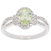 Elegant Green Peridot ring in 14K white gold, featuring a diamond accent for added sparkle.