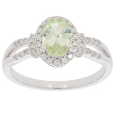 Elegant Green Peridot ring in 14K white gold, featuring a diamond accent for added sparkle.