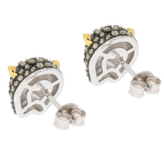 Unique sterling silver earrings with black stones and gold accents, perfect for adding a playful touch to any outfit.