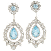 Elegant pear blue topaz sterling silver earrings with intricate design and sparkling accents.