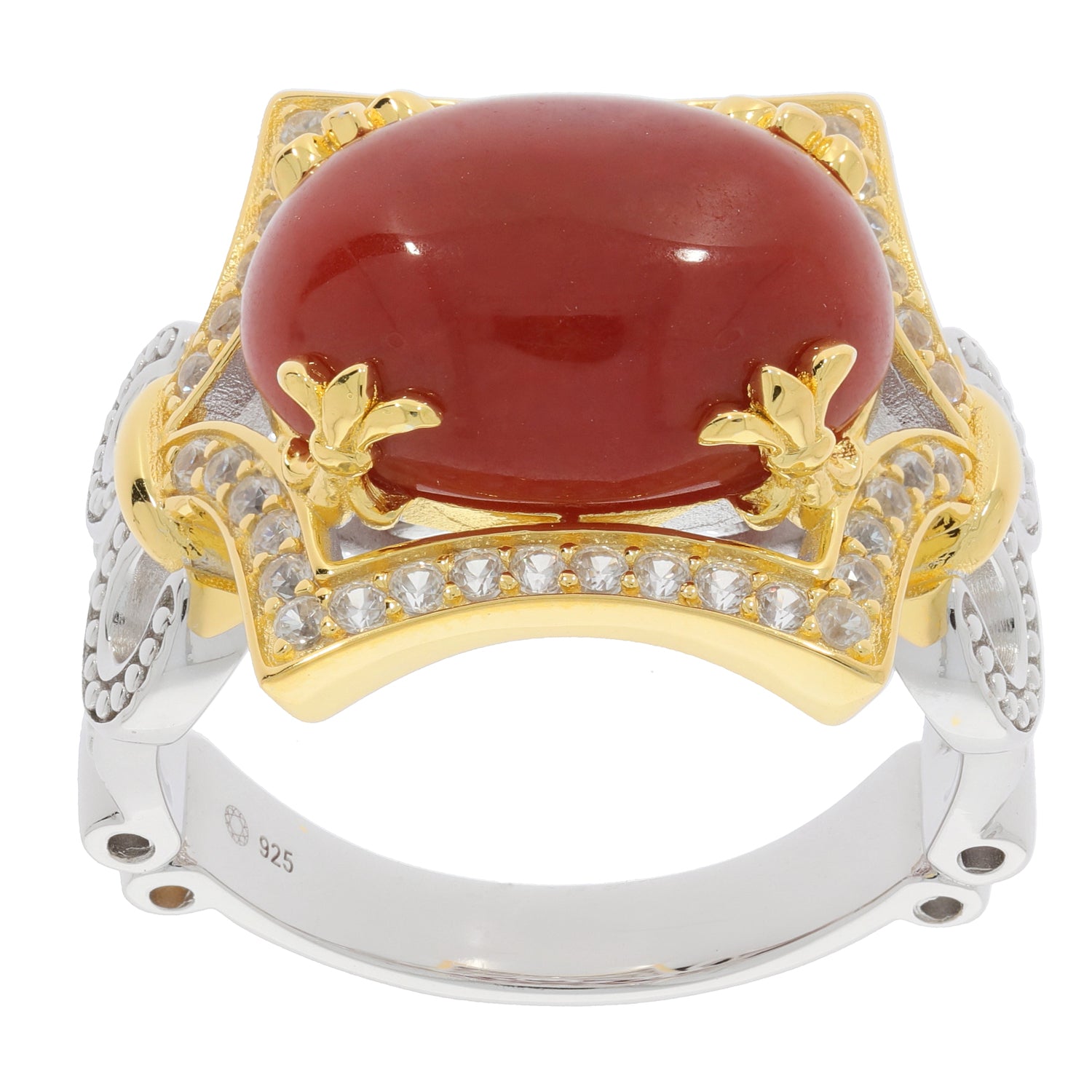 Elegant oval red coral sterling silver ring with sparkling accents and gold details, perfect for sophisticated style.