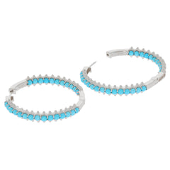 Round blue turquoise sterling silver hoop earrings with sparkling accent stones.