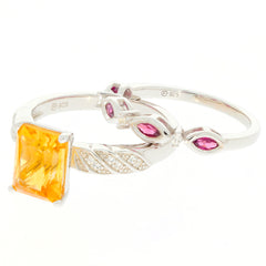 Yellow citrine sterling silver ring with pink accents and sparkling gemstones, elegant jewelry piece for sophisticated style.