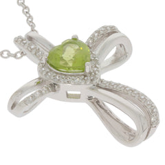 Green Peridot heart pendant in sterling silver, embellished with diamonds for elegant styling.