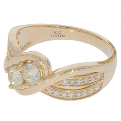 14K yellow gold ring with round diamonds and accent stones, showcasing timeless elegance and luxury.