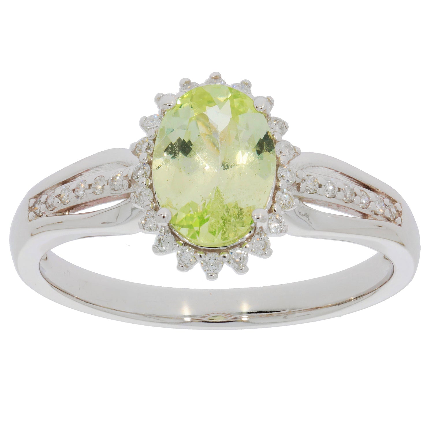Elegant Green Peridot ring set in 14K white gold with diamond accents, showcasing luxury and sophistication.